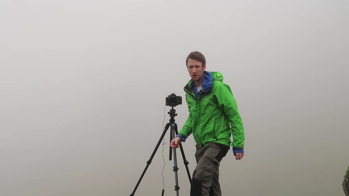 Complete whiteout fog around Old Man of Storr with zero visibility