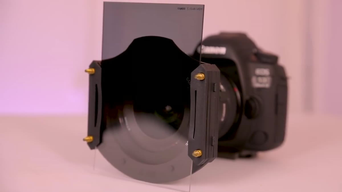 ND grad filter shown in hand before bracketing explanation