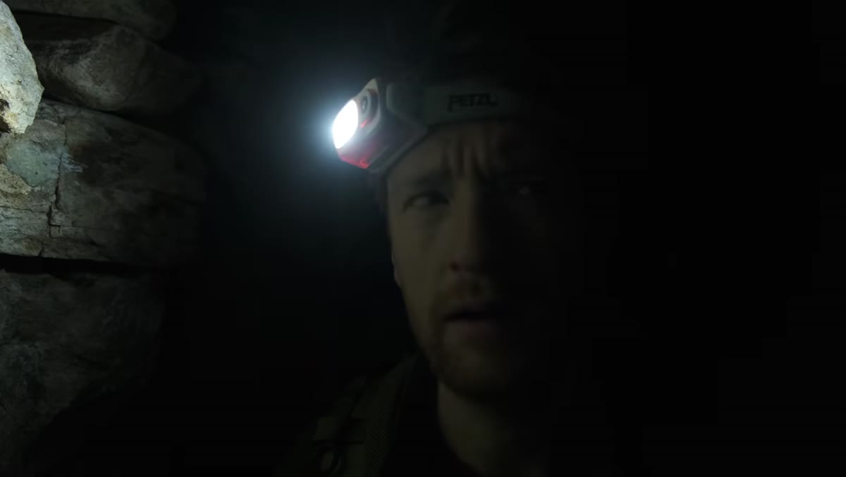 Heaton hiking at night, halfway up the mountain in the dark