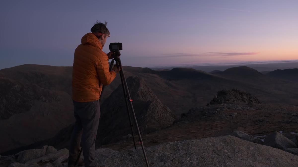 Camera pointed north toward Tryfan mountain peak with rocky outcrop at right