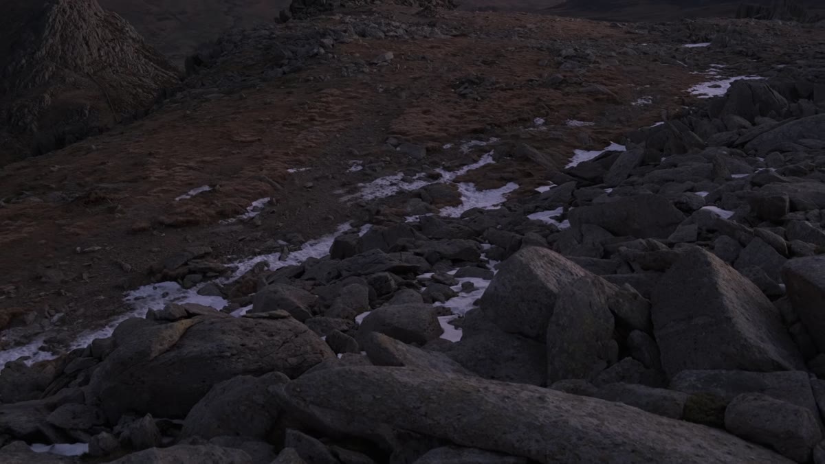 Patchy snow in the lower foreground disrupting the frame