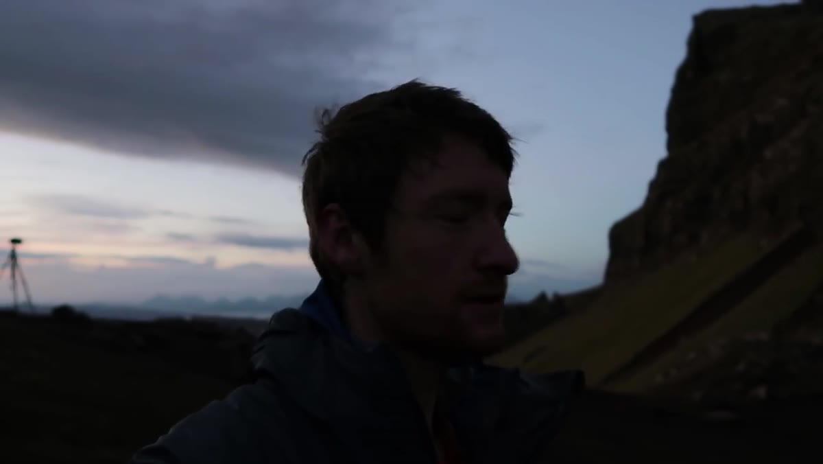 Tripod set up and leveled on the hillside before sunrise