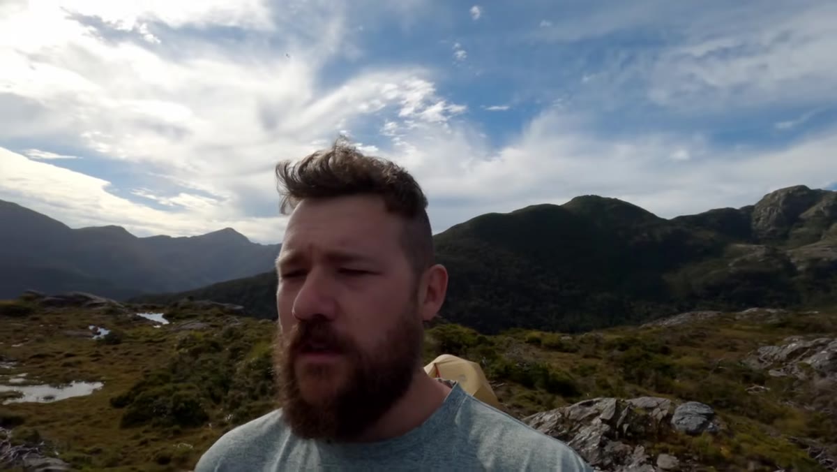 Sky beginning to shift color over Fiordland peaks