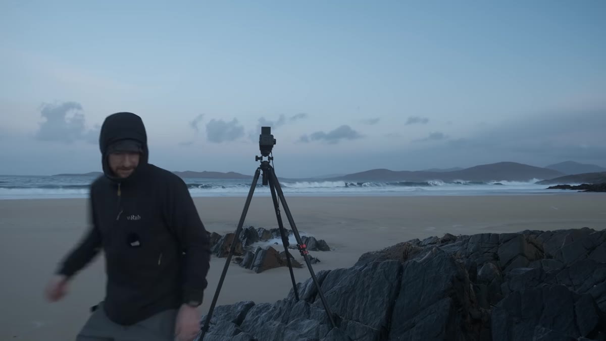 Photographer realizing cable release with dog-leg is missing