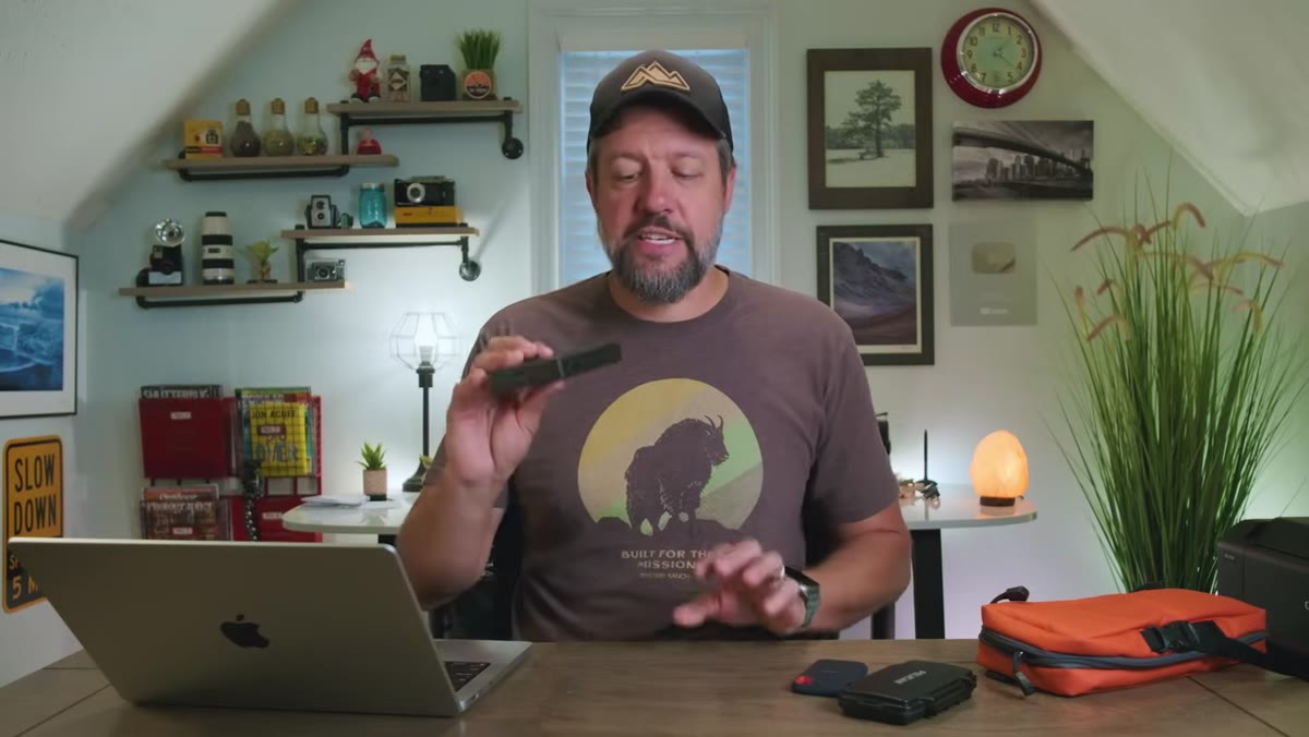 caption: Large hard drive labeled &ldquo;2024 Backup&rdquo; sitting on desk