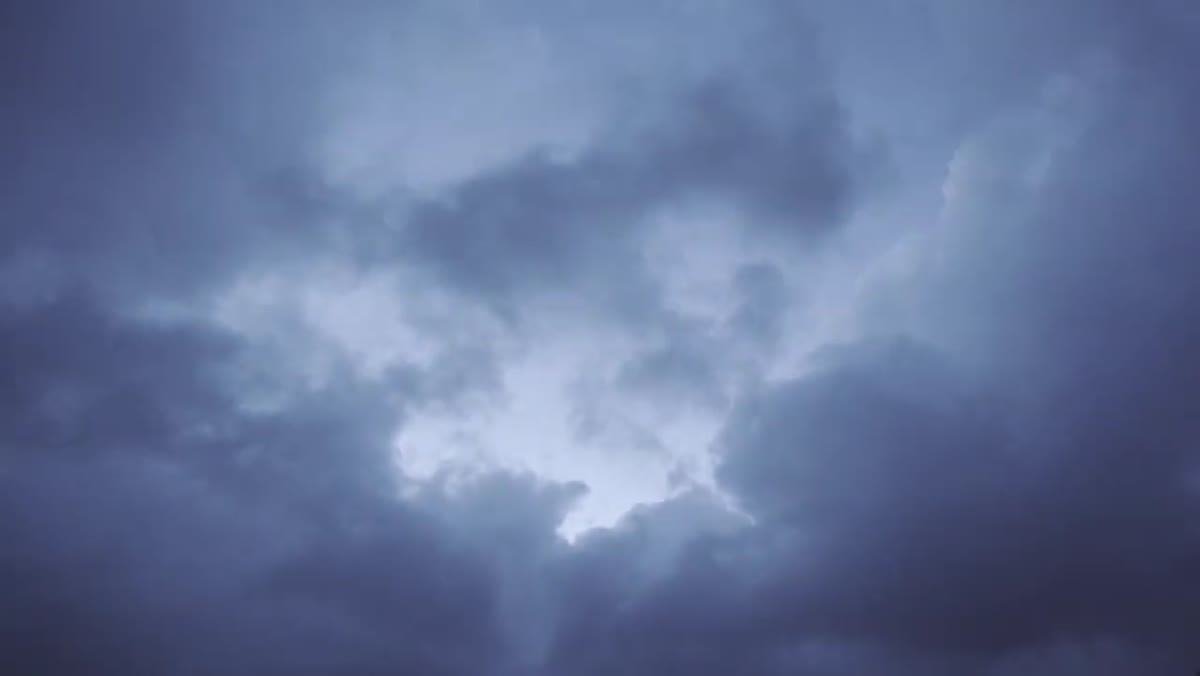Overcast sky above the dam with breaks in cloud cover