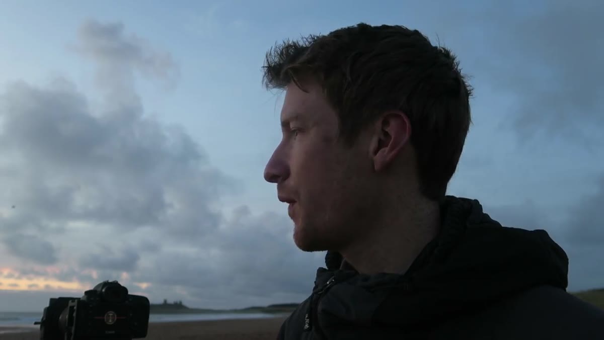 Camera pointed toward the S-shaped river and open sea