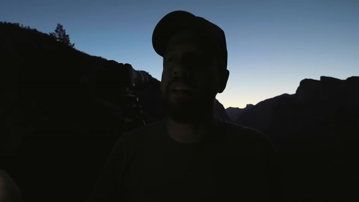 Photographer at Tunnel View before sunrise, overcast flat sky