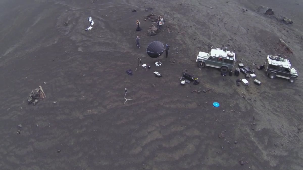 Aerial view showing parabolic reflectors at significant distance from subject