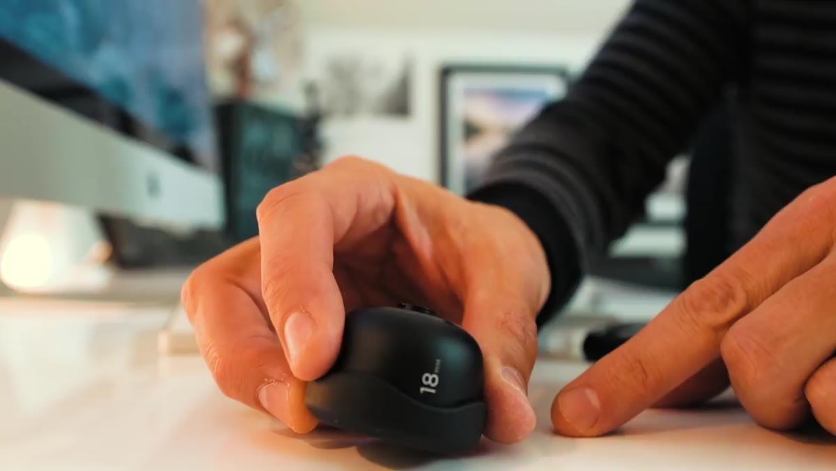 18mm Moment wide-angle lens close-up in hand