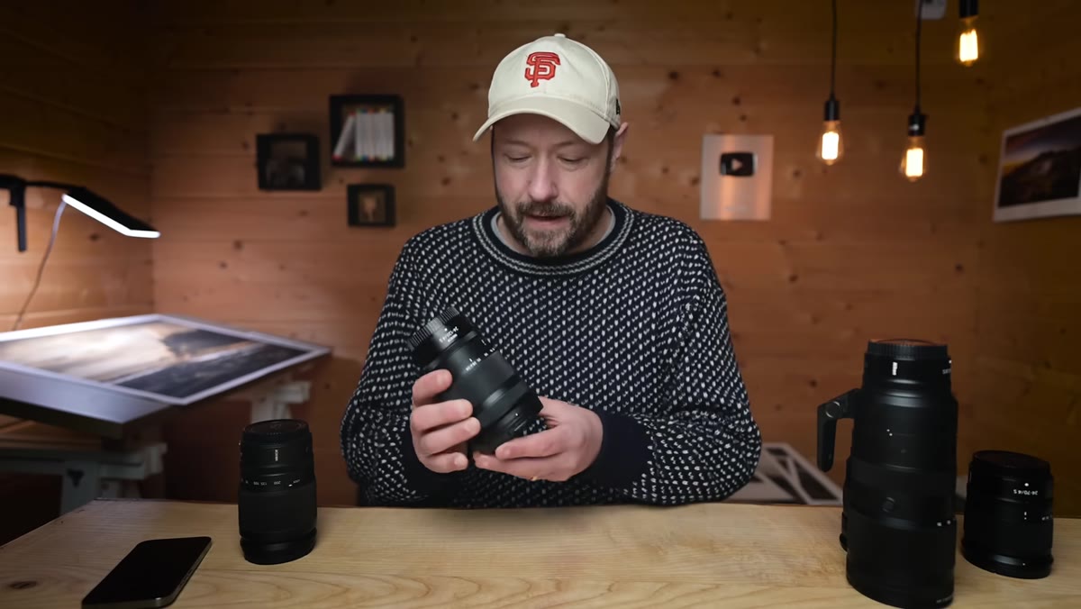 Nigel reviewing photos on camera, discussing focal length data