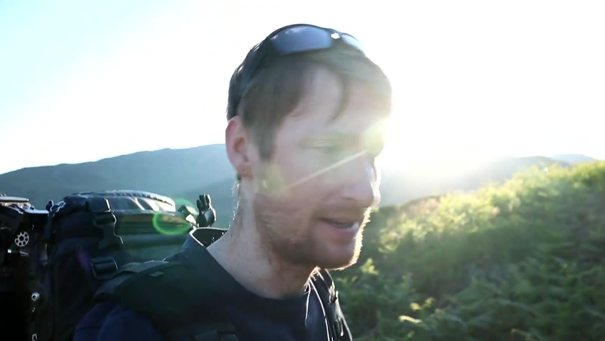 Heaton moving quickly to compose as light shifts across the fells