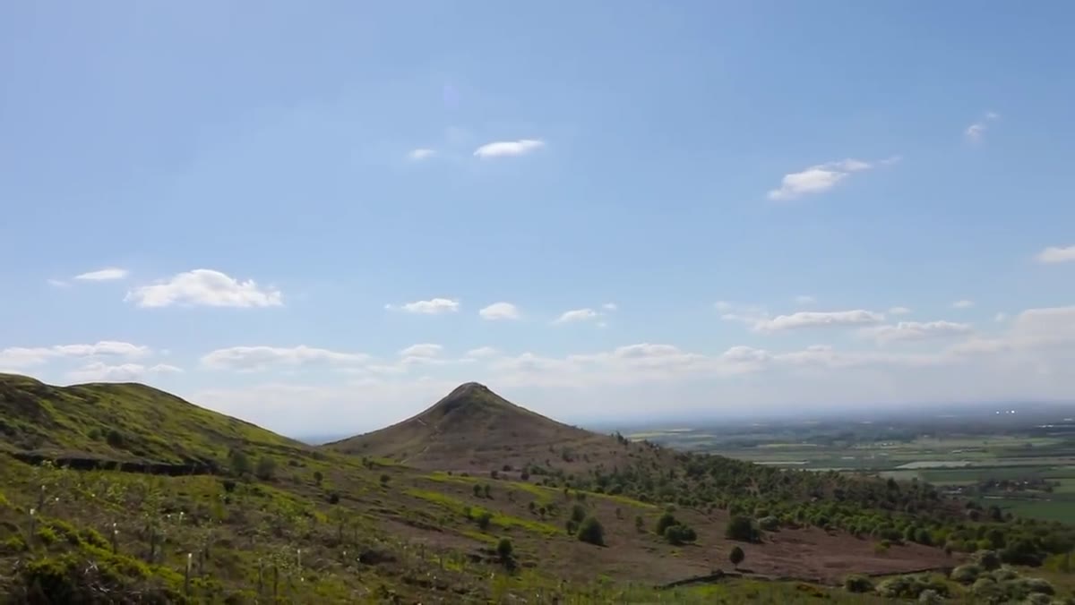 Camera viewfinder showing horizon placed at lower third with clouds filling upper frame