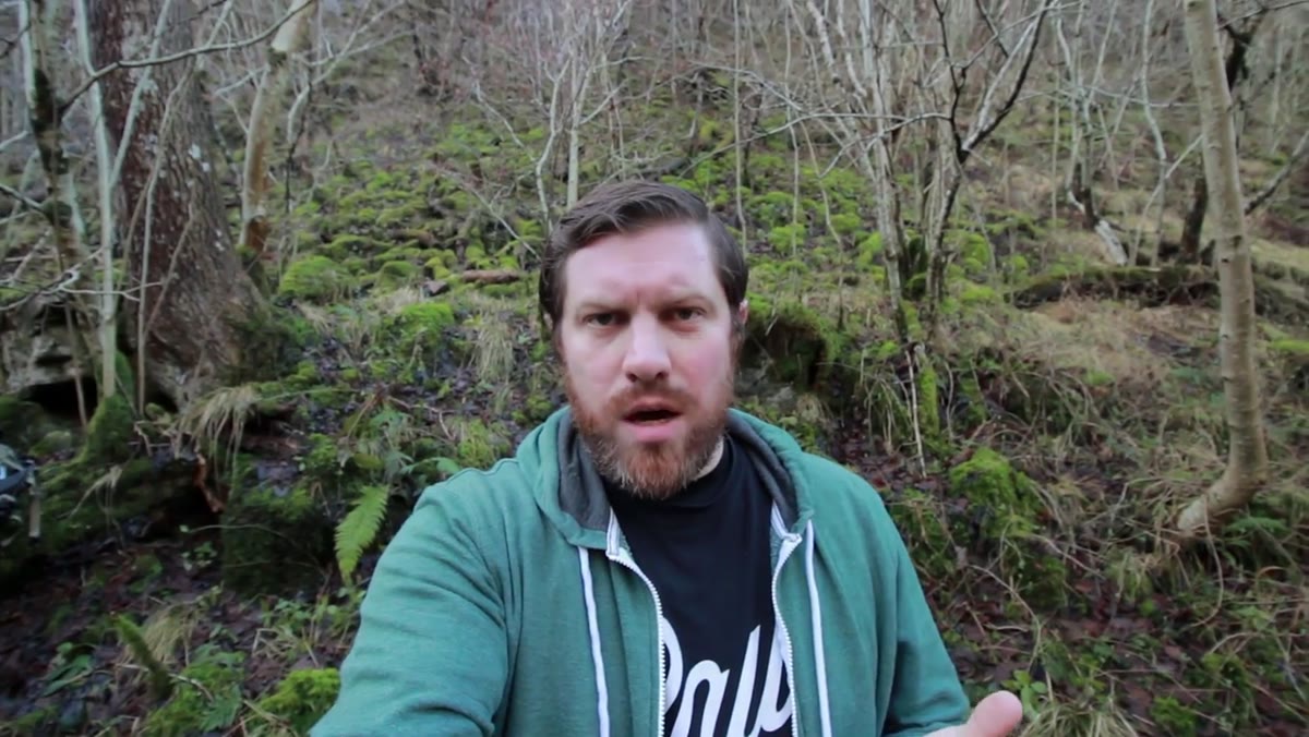 Creator explaining winter photography challenges on the trail
