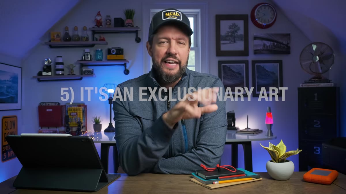 caption: Mark explaining exclusionary framing concept at a location