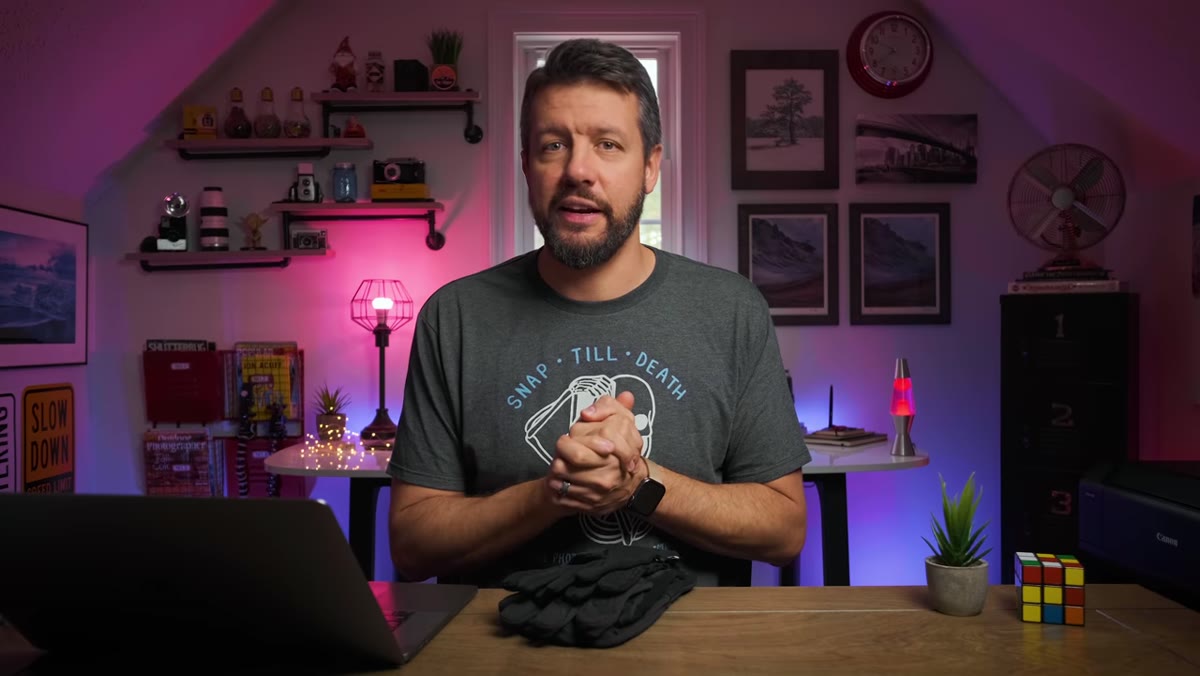Mark demonstrates layering thin touch-screen gloves beneath heavier outer gloves