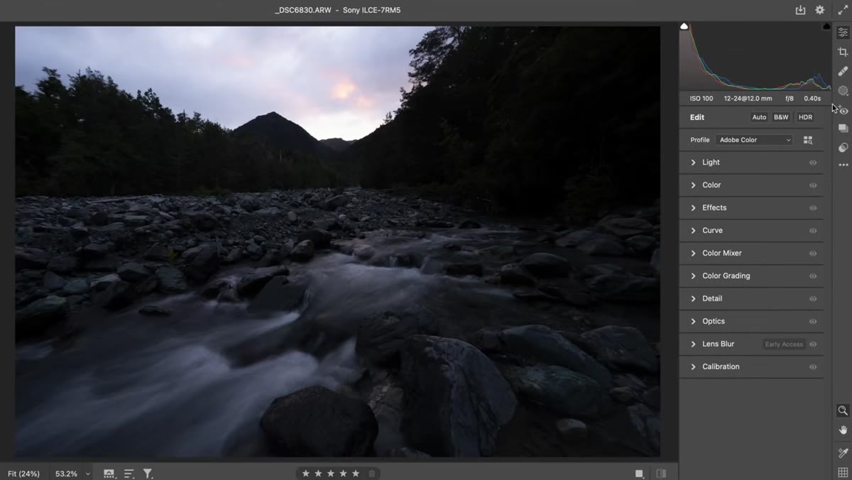 Histogram showing clipped highlights and dense shadows in a backlit scene