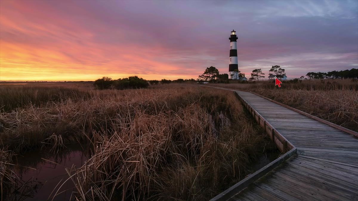 Boardwalk leading to lighthouse with clear visual pathway