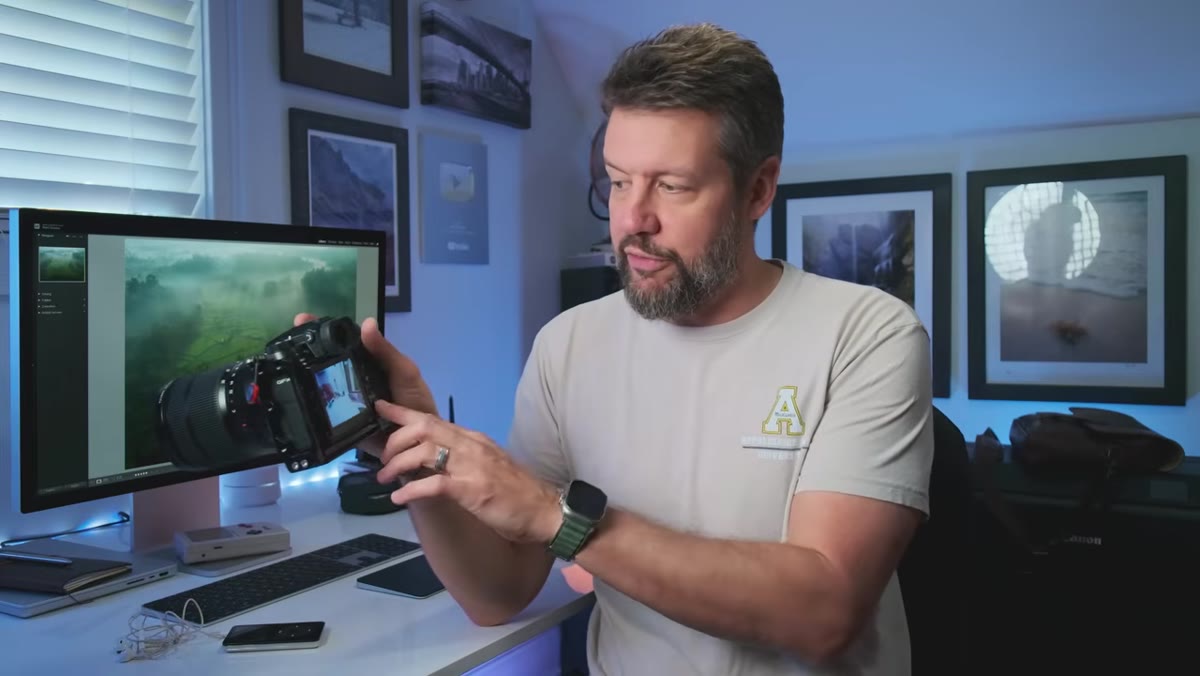 Photographer reviewing image edges on LCD screen
