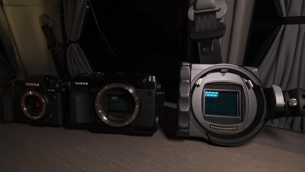 Heaton showing the scale of Phase One sensor relative to hand