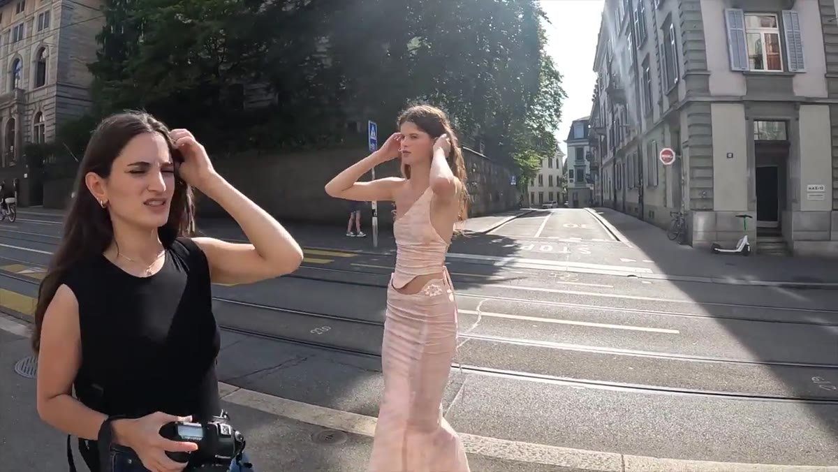 Photographer assessing light quality and direction at new spot
