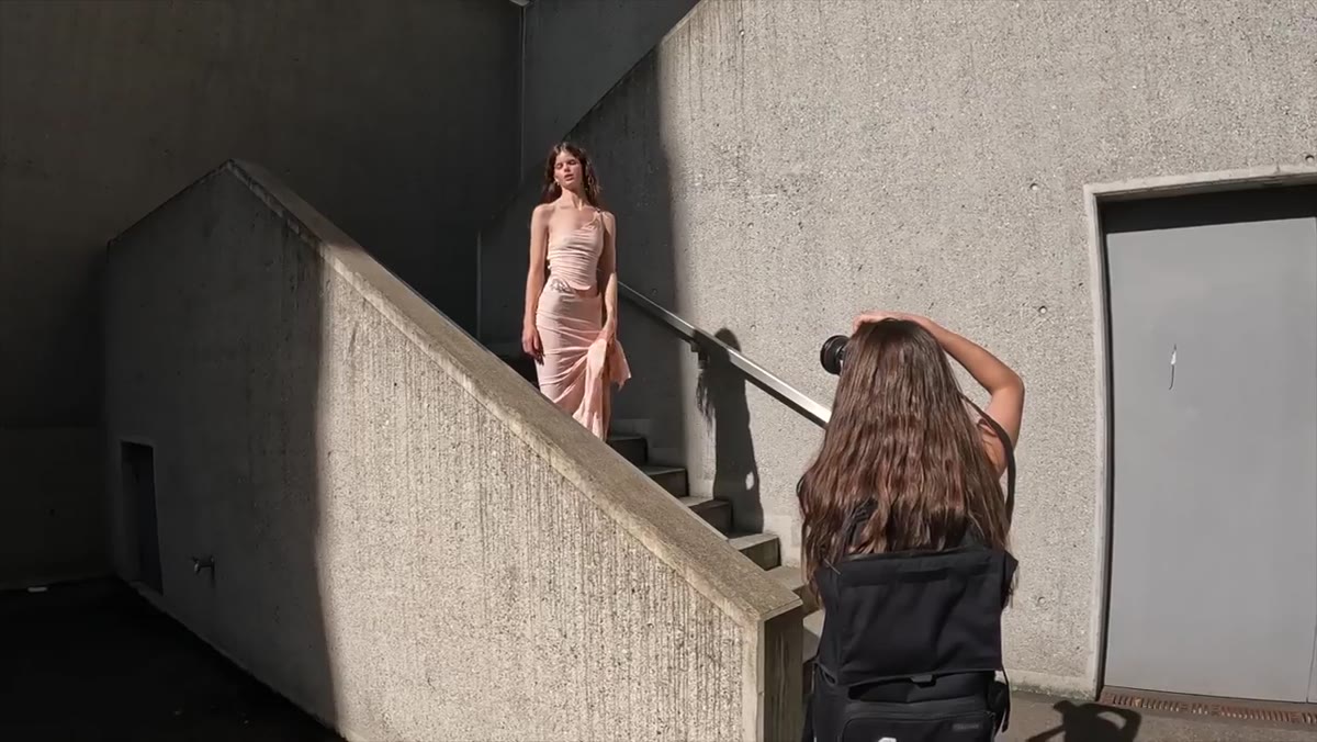 Photographer directing subtle hand and chin position changes
