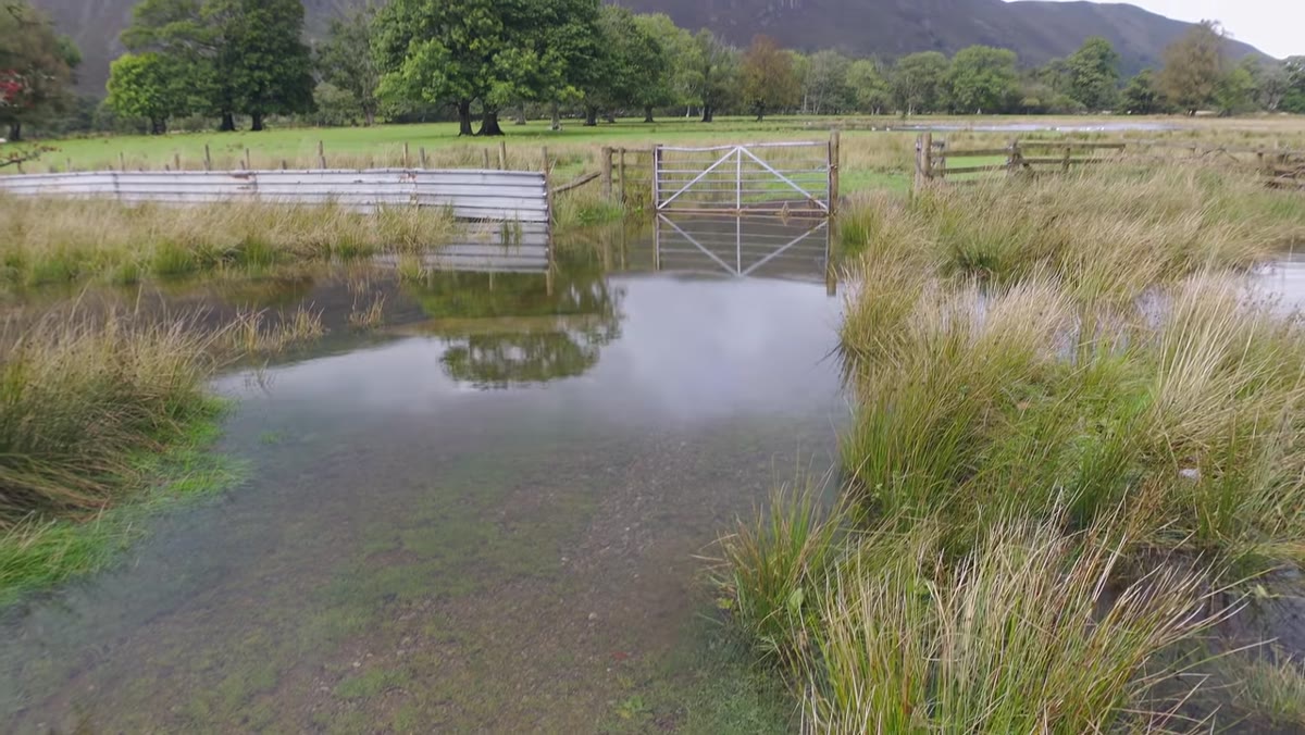 Flooded path blocking access to planned lakeside location