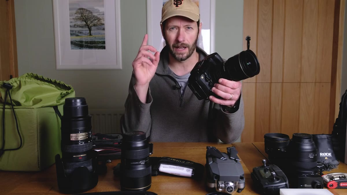 L-bracket attached to camera base, demonstrating quick attachment to tripod
