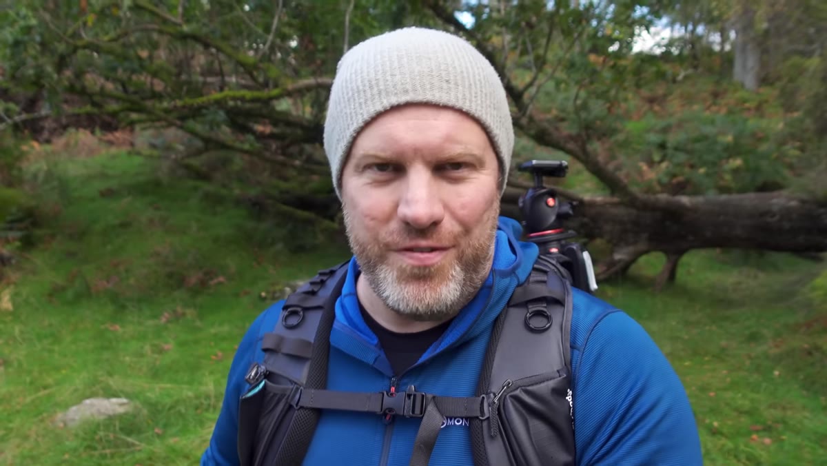 Adam hiking up a fell in the Lake District