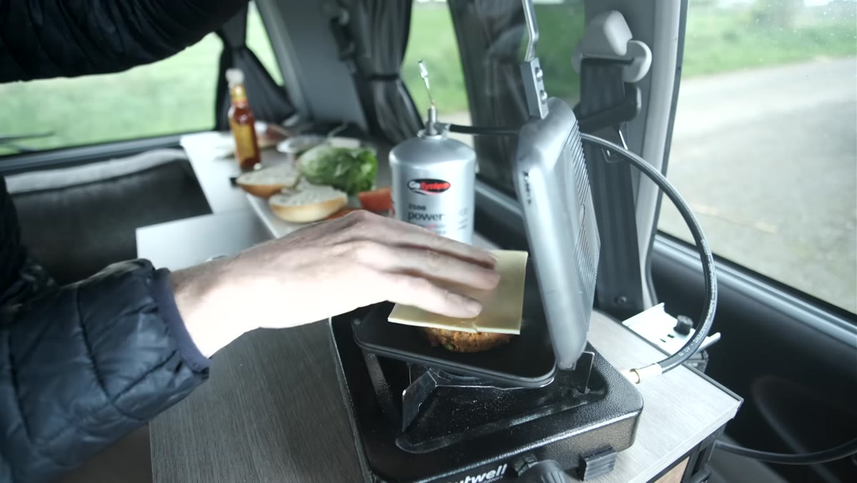 Heaton eating a meal before heading out to photograph