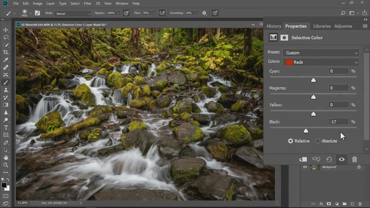 Black slider being moved to reveal red tones in image