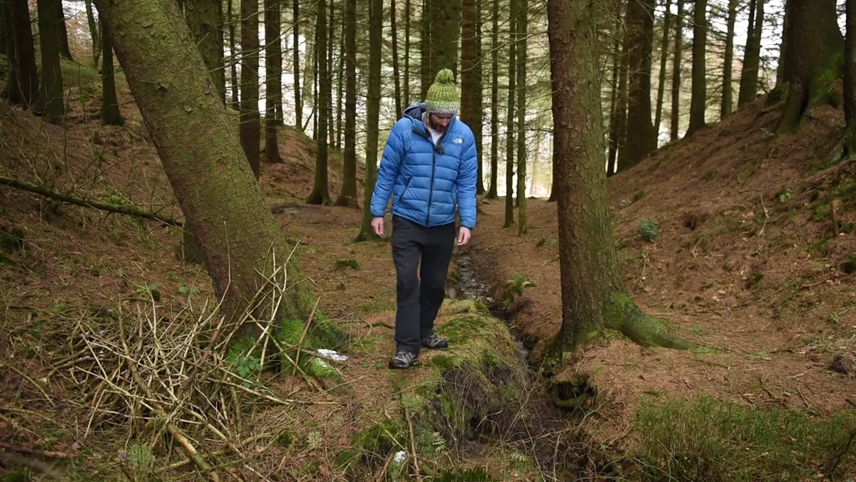 Nigel walking a new river location with his dog
