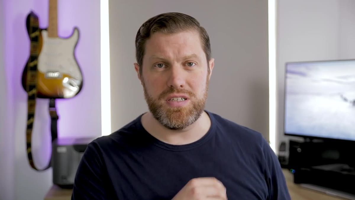 Host explaining the difference between mechanical picture-taking and intentional art