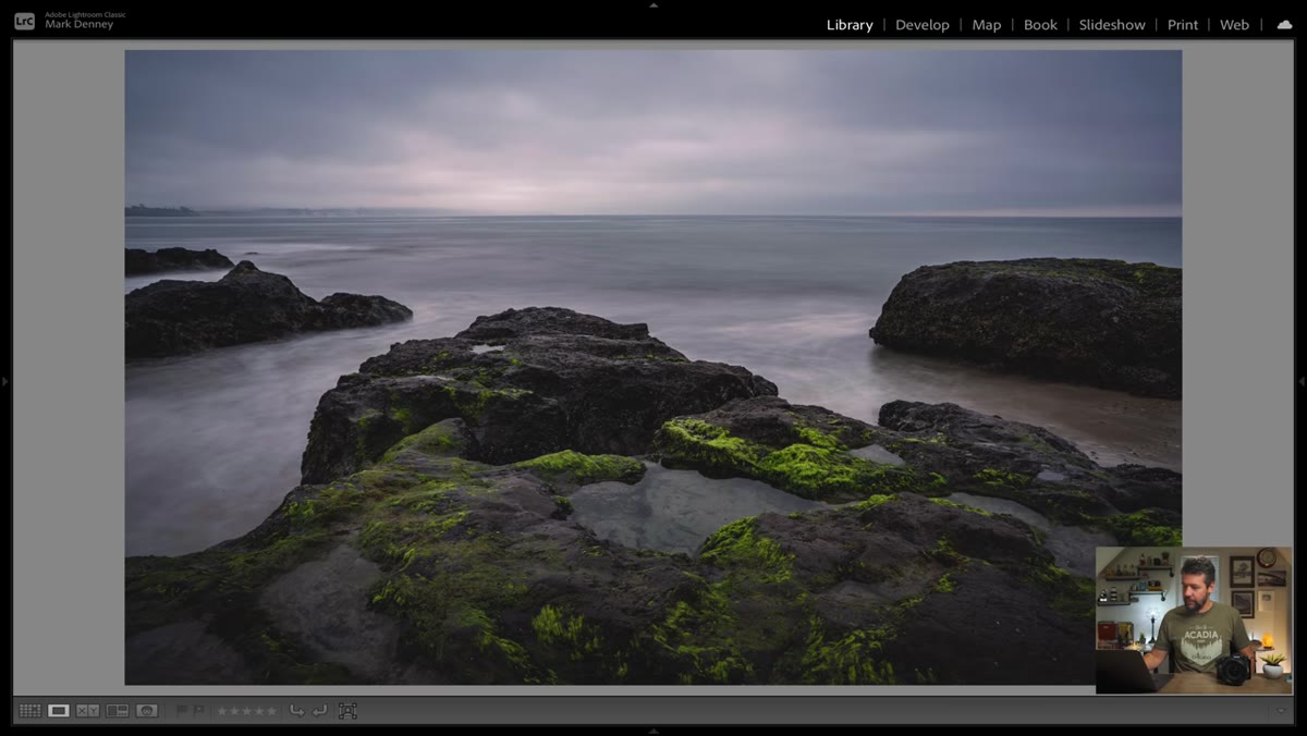 Camera raised slightly, both water channels now visible flanking the rock