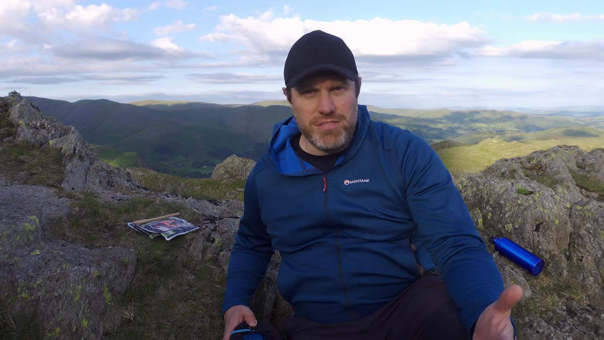 Adam cooking with portable stove, alpkit brew kit visible