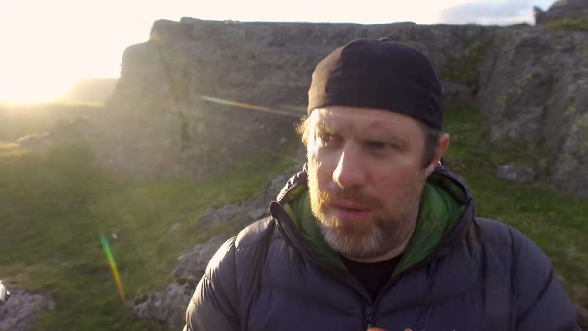 Adam explaining layered mountain composition and how light reveals form