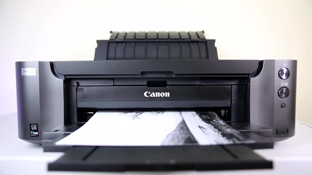 Adam explaining the cost-versus-value decision for photo printers